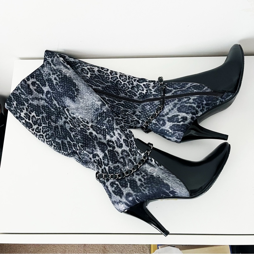 LuvShoe’s Black and White Leopard Print Chain Detail Heeled Boots